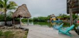 Stunning water view from the deck of the waterfront home in Ambergris Caye, Belize, showcasing clear blue waters and picturesque surroundings