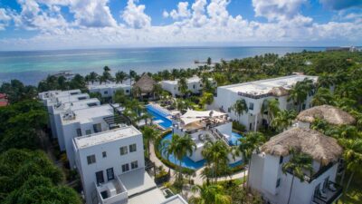 Aerial view of Las Terrazas Resort, Ambergris Caye, showcasing beachfront location and tropical grounds.